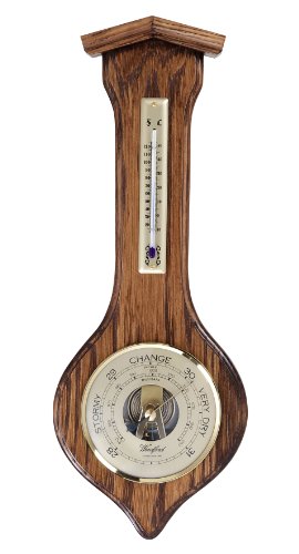 Tradicional barómetro de pared de madera en roble macizo con termómetro.