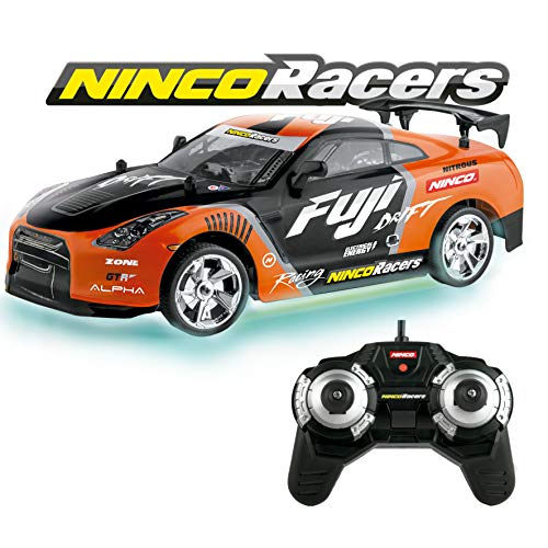Ninco NH93114, emis NincoRacers Fuji Coche para campeonato de Drift con luces de neón en la parte baja del chasis efecto suelo, emisora 2.4GHz, color naranja y negro