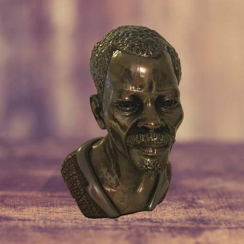 Escultura Africana - Hombre Ndebele - Pieza de Cabeza Tallada de la Tribu Africana Ndebele. Esta Obra de Arte Multi-Metal es buscada y atesorada en Todo el Mundo como una verdadera Memoria de África.