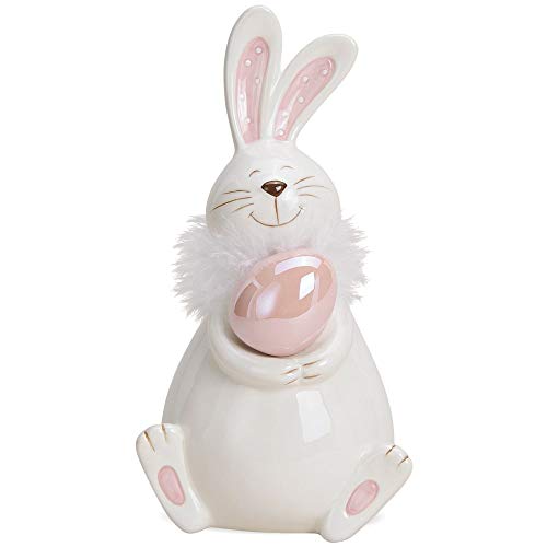Matches21 - Conejo de Pascua con huevo de Pascua de cerámica, color blanco y rosa, 1 unidad Decoración de Pascua, decoración primaveral, en 2 tamaños, cerámica, 20 cm.
