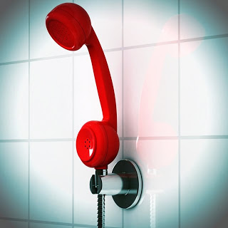 alcachofa de ducha con forma de teléfono