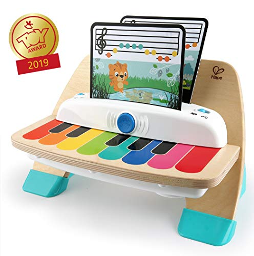 Baby Einstein Hape Magic Touch Piano, juguete musical de madera, inluye 3 partituras y 6 canciones diferentes, a partir de 12 meses Baby Einstein Hape Magic Touch Piano, juguete musical de madera, inluye 3 partituras y 6 canciones diferentes, a partir de 12 meses
