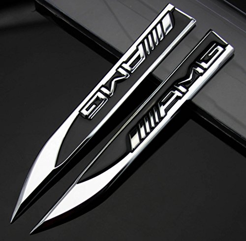 AMG - Emblema autoadhesivo con diseño de cuchillo de metal (2 unidades) para vehículos AMG Serie A, B, C, E, S, R (color negro). AMG - Emblema autoadhesivo con diseño de cuchillo de metal (2 unidades) para vehículos AMG Serie A, B, C, E, S, R (color negro).