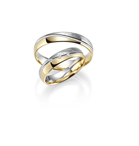Alianzas de oro 333, precio conjunto de oro amarillo y blanco – Rubin Juweler - incluye grabado y 3 circonitas. Alianzas de oro 333, precio conjunto de oro amarillo y blanco – Rubin Juweler - incluye grabado y 3 circonitas.