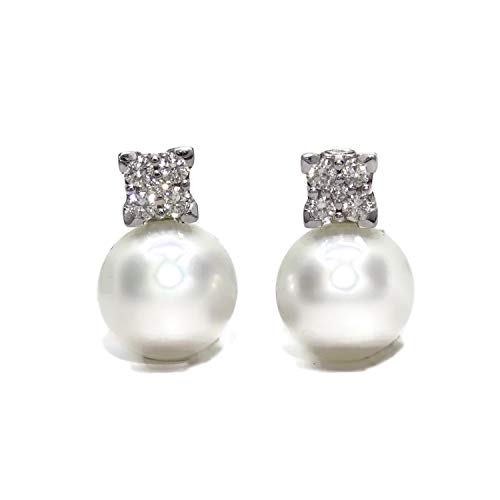 Preciosos pendientes de oro blanco de 18k con 0.58 cts de diamantes y perlas australianas de 12mm. Cierre omega.