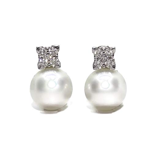 Preciosos pendientes de oro blanco de 18k con 0.58 cts de diamantes y perlas australianas de 12mm. Cierre omega. Preciosos pendientes de oro blanco de 18k con 0.58 cts de diamantes y perlas australianas de 12mm. Cierre omega.
