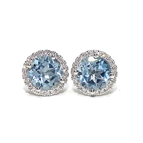 Pendientes de oro blanco de 18k para mujer con 40 diamantes auténticos talla brillante que suman de 0.23cts y 2 topacios azules de 7mm y 3.05cts.