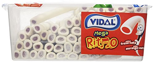 Vidal Golosinas Mega Ritmo. Regaliz relleno con intenso sabor a Fresa-Nata. Color blanco y su interior rojo. Bandeja 70 unidades.