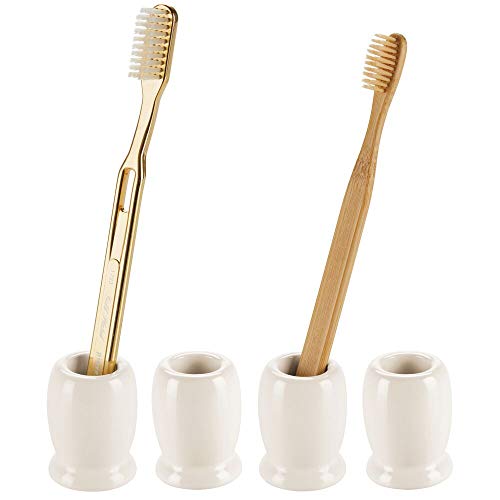 mDesign Juego de 4 vasos para cepillos de dientes de diseño moderno y compacto – Portacepillos de dientes redondos hechos de cerámica – Accesorios de baño de pie para lavabos o muebles espejo – crema