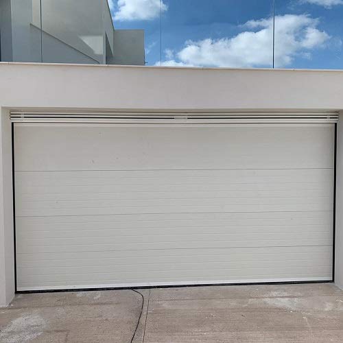 Puerta seccional woodgrain blanca. 2500mm x 2250mm.