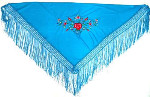 Medio Mantón de Manila (Pico). Color Azul. Medidas: 110x50 cms. (flecos de 17 cms. no incluídos en las medidas). El bordado ocupa 30x16 cms. Medio Mantón de Manila (Pico). Color Azul. Medidas: 110x50 cms. (flecos de 17 cms. no incluídos en las medidas). El bordado ocupa 30x16 cms.