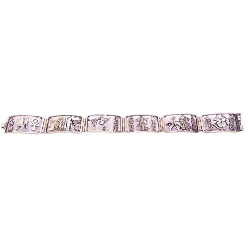 Pulsera de plata hecha en Egipto. Mide de largo 19 cm y alto 2 cm. Lleva motivos del Antiguo Egipto como la lllave de la vida, el escarabajo de la suerte, Tut Ank Amón, Cleopatra, Nefertiti y Ramsés I