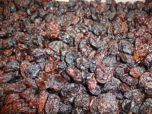 Uvas Pasas Negras Pack de 1 kg | Uvas Deshidratadas o Desecadas | Sin Semillas y Sin Azúcar | Ideal para Combinar con Chocolate o como Aperitivo | Uvas Secas Comestibles De Gran Calibre | Dorimed