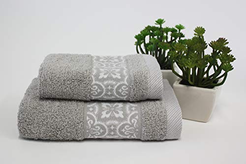 Juego 1 + 1 toalla de baño Susy con volante de Jacquard, cara y invitado Medidas: Cara: 50 x 100 cm. Invitación 38 x 58 cm. 100% algodón. Esponja de alta calidad procedente de Portugal. (Gris claro)