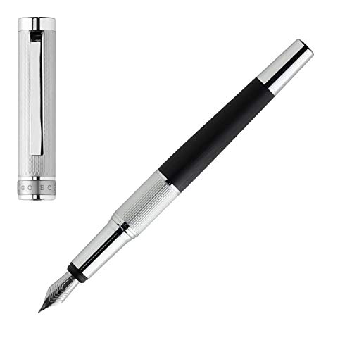 Hugo Boss: Pluma estilográfica Dual Cromo-Black. Bolígrafo con superficie grabada metálica, con inserción moderna de aluminio cepillado y anillo mate con garra Hugo Boss. Hugo Boss: Pluma estilográfica Dual Cromo-Black. Bolígrafo con superficie grabada metálica, con inserción moderna de aluminio cepillado y anillo mate con garra Hugo Boss.
